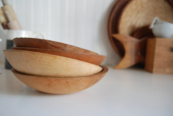 Photograph of a set of mid century modern wood bowls